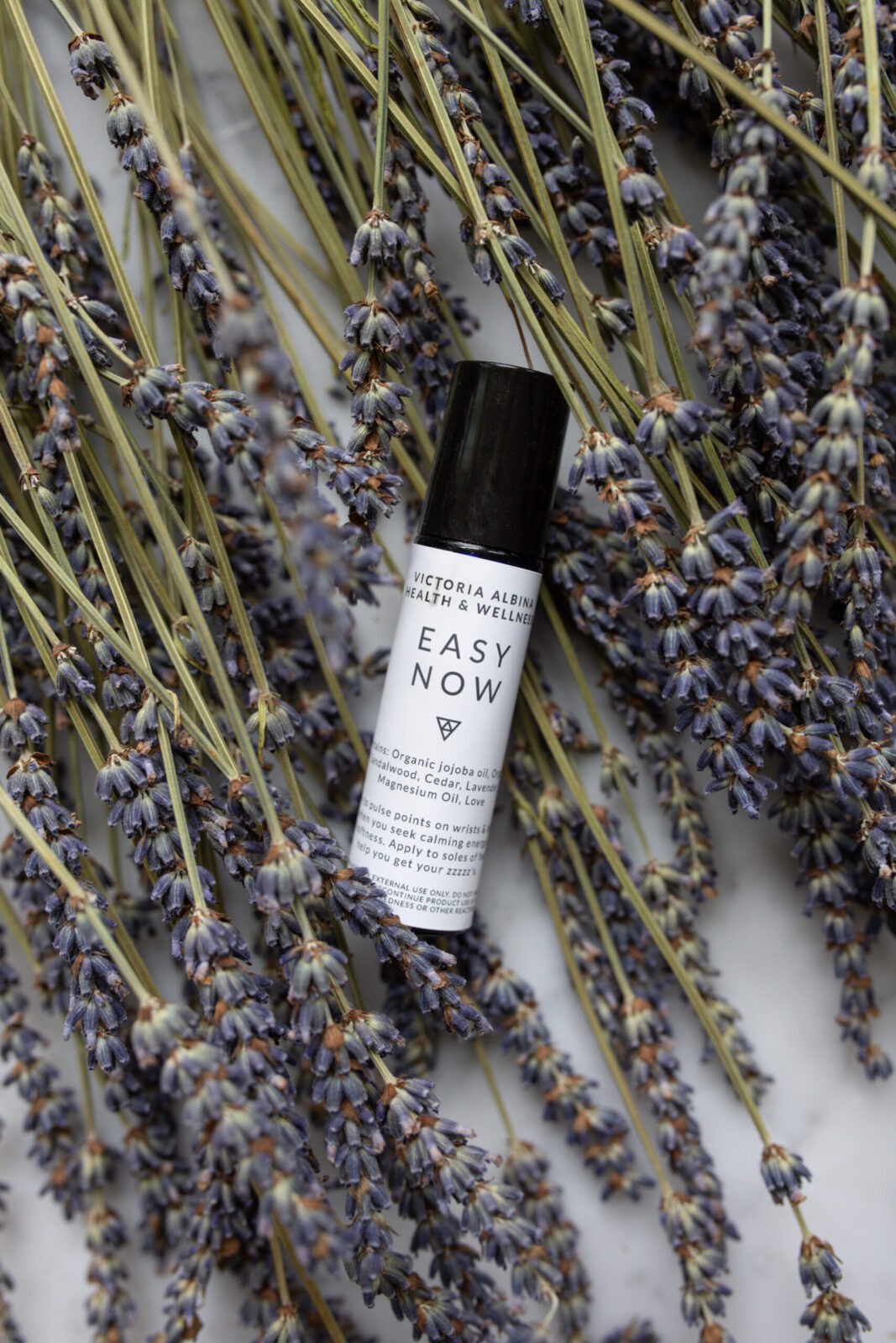 easy now essential oil roller on lavendar